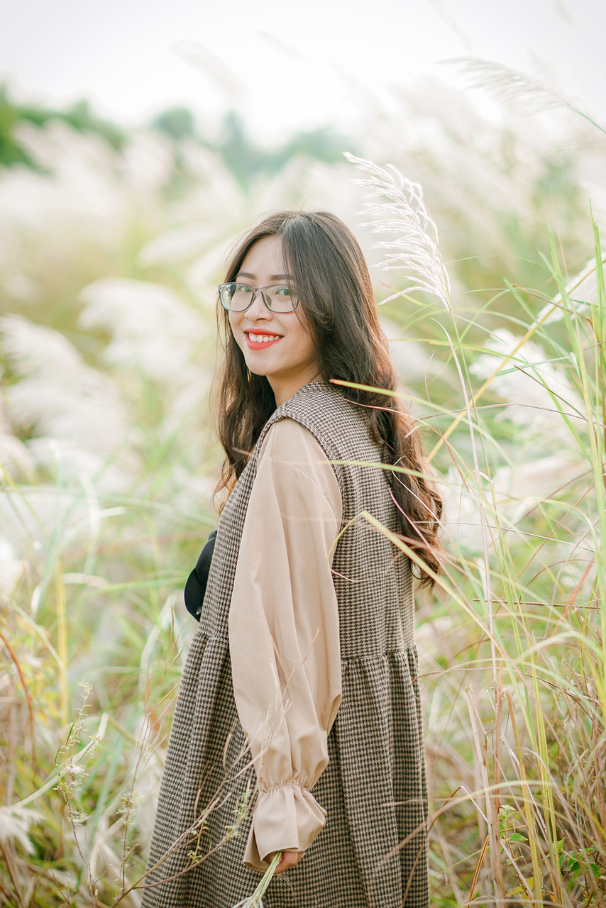 Pretty Asian Girl With Eyeglasses Posing In Her Gorgeous Outfit In