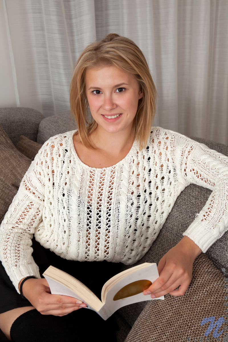 Young blonde girl Elza A makes her nude modeling debut in over the knee  socks - NakedPics