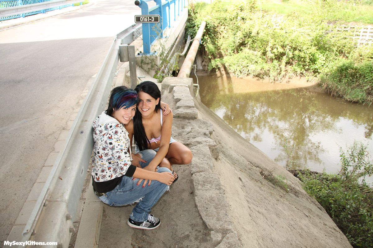 Teen lesbians undress by the side of a road before sex down by the river -  NakedPics