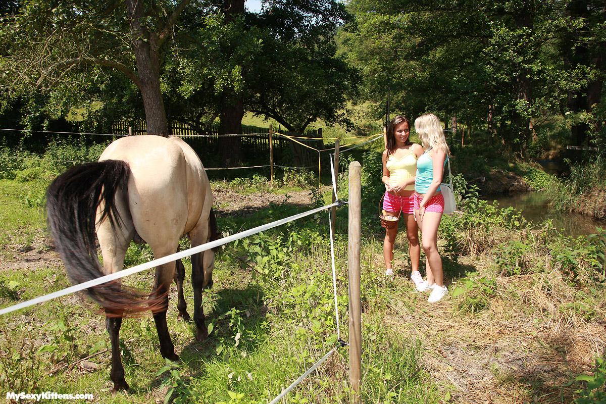 Young girls have lesbian sex on a blanket next to a horse paddock -  NakedPics