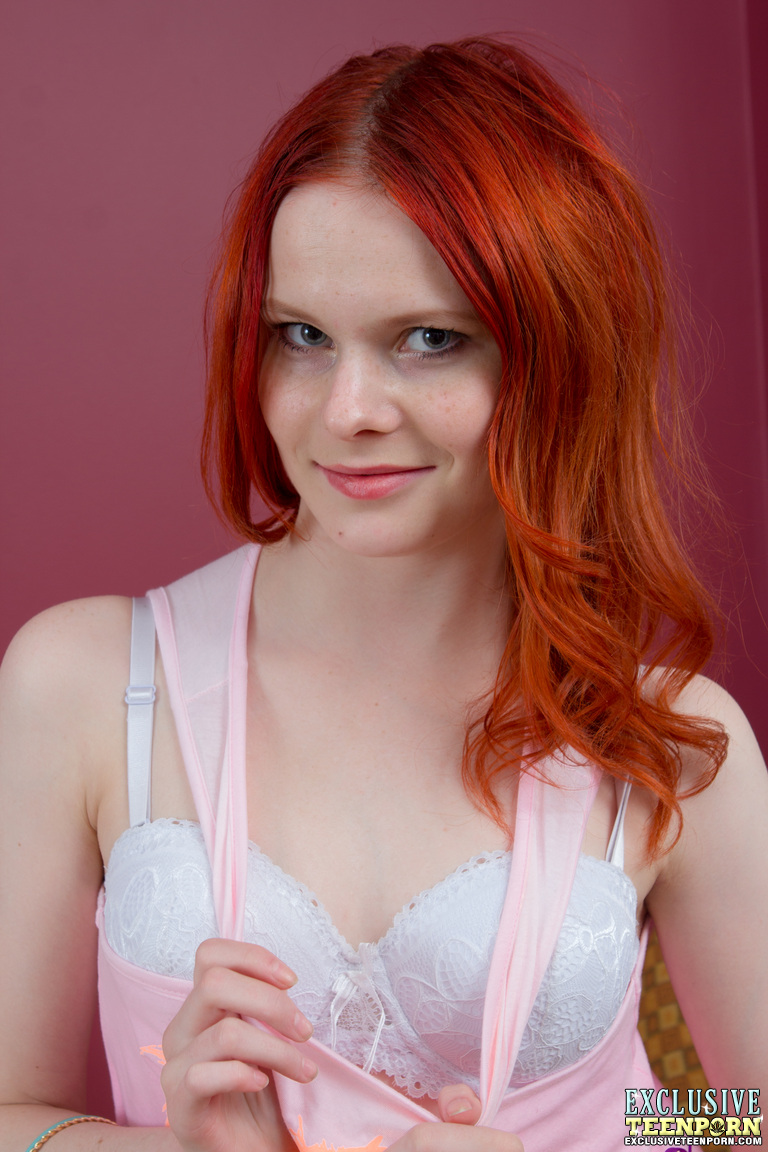 Young redhead Doreen fingers her pink pussy during close-up action -  NakedPics