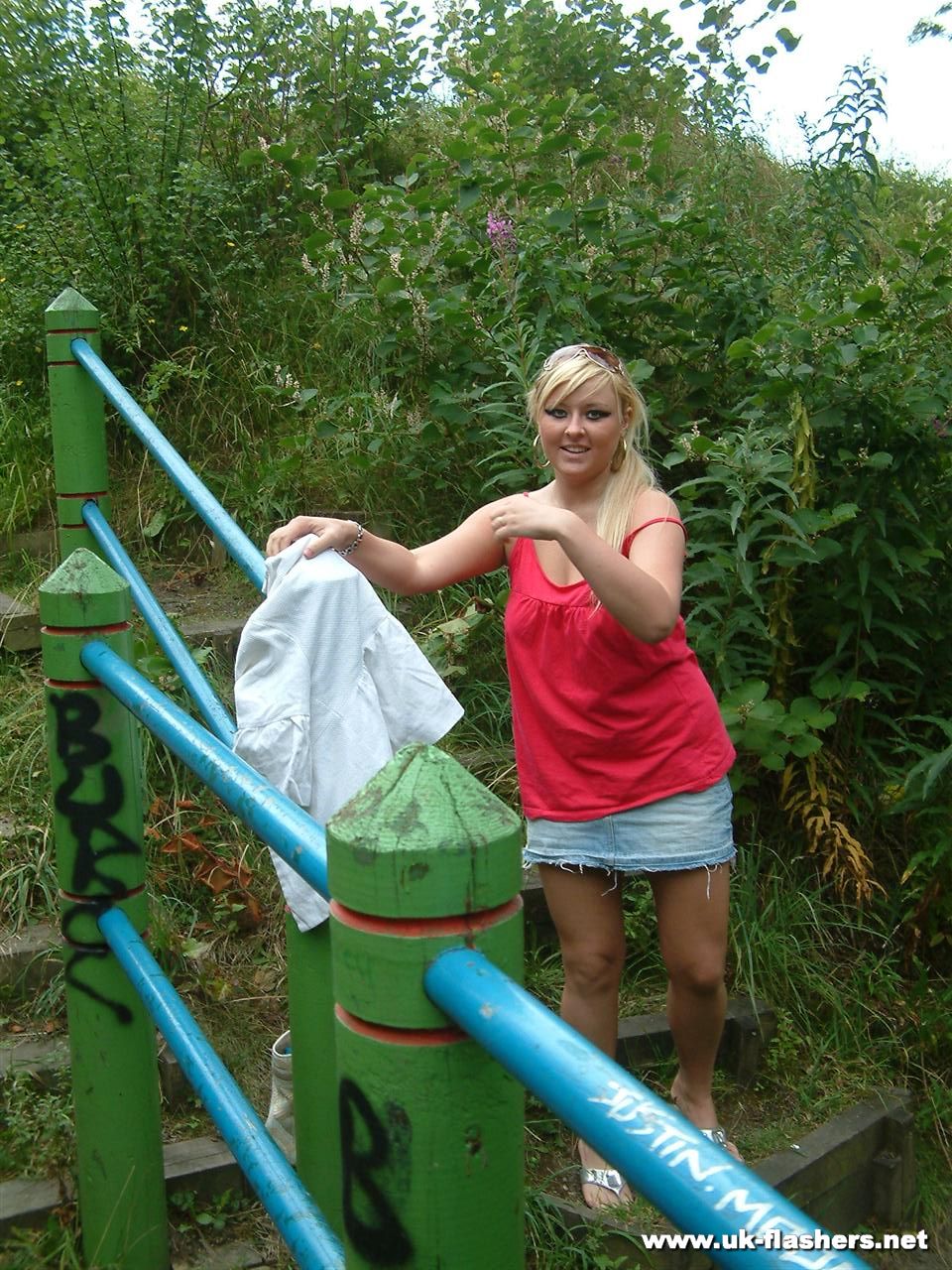 Overweight UK female with blonde hair strips naked on a popular walking trails pic