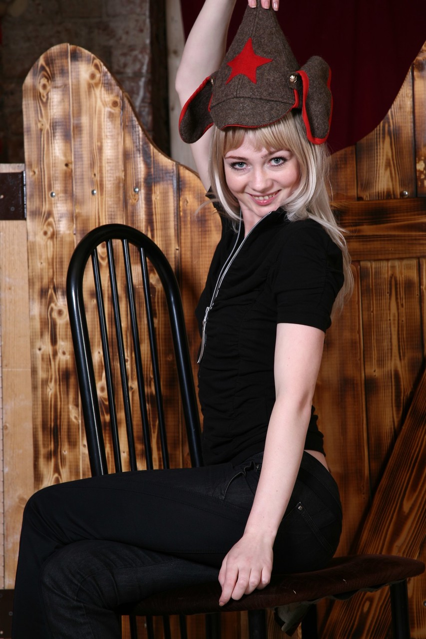 Slender teen amateur Alanya strips and poses naked on a kitchen chair -  NakedPics