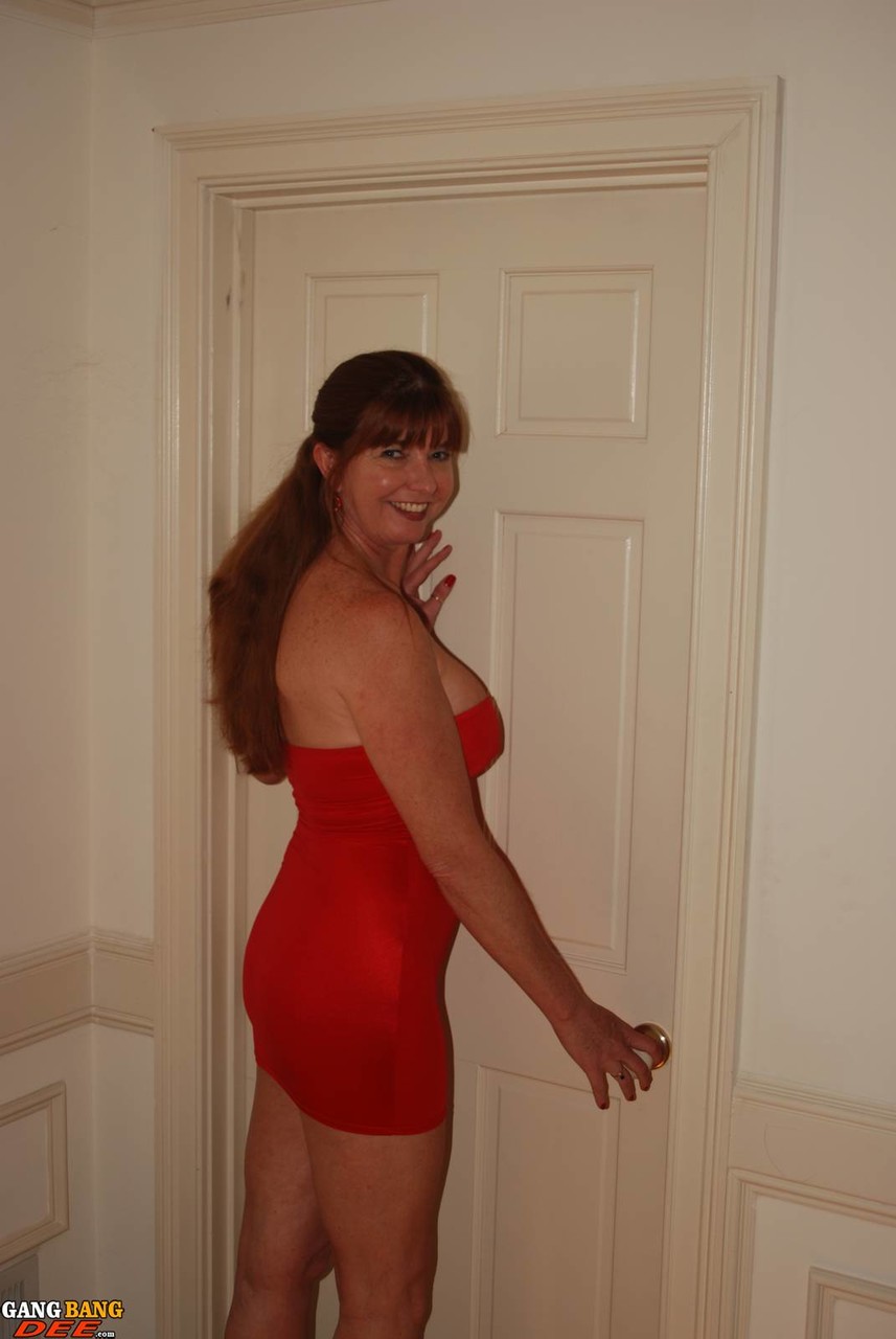 Mature secretary in a slutty red dress enjoying hot office sex with her  boss - NakedPics