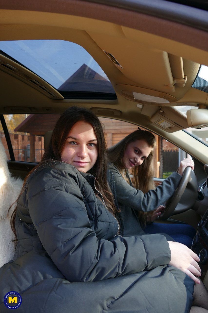 Long haired European lovers take a selfie in the car before lesbian sex  action - NakedPics