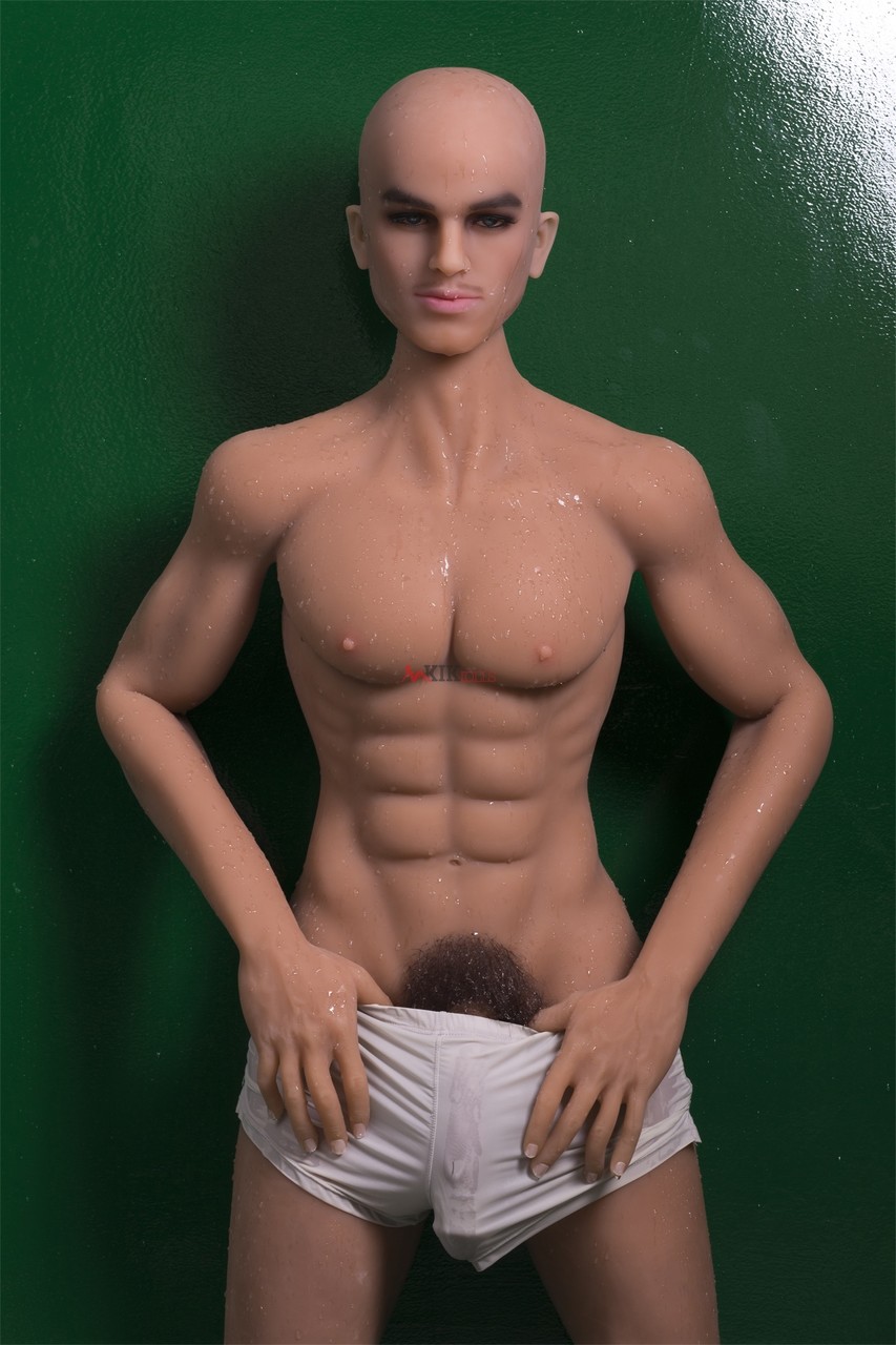 Brunette male sex doll Lucas shows off his lean body hairy dick