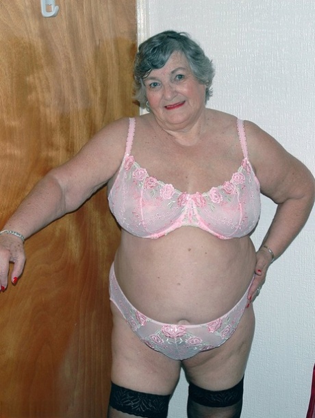 Obese old woman Grandma Libby masturbates on her bed in stockings