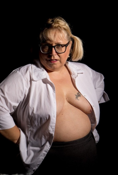 Blonde fatty Lexie Cummings touches her small breasts while wearing glasses