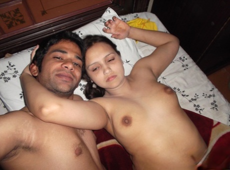 Indian couple take nude selfies on their bed before she puts on her bra