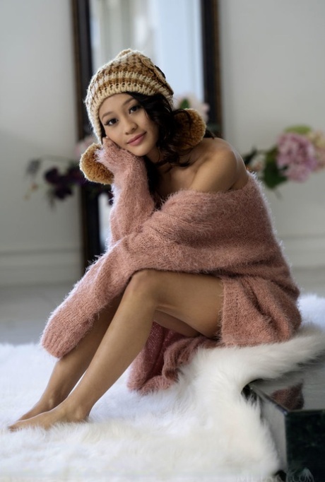 Adorable teen Jasmine Grey sheds her sweater & panties to pose nude in a toque
