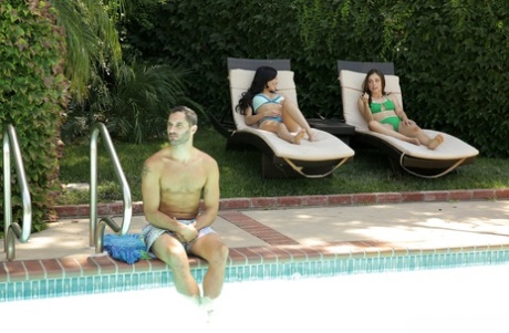 Horny girls Savannah Sixx & Lily Glee seduce a hunk while hanging at the pool
