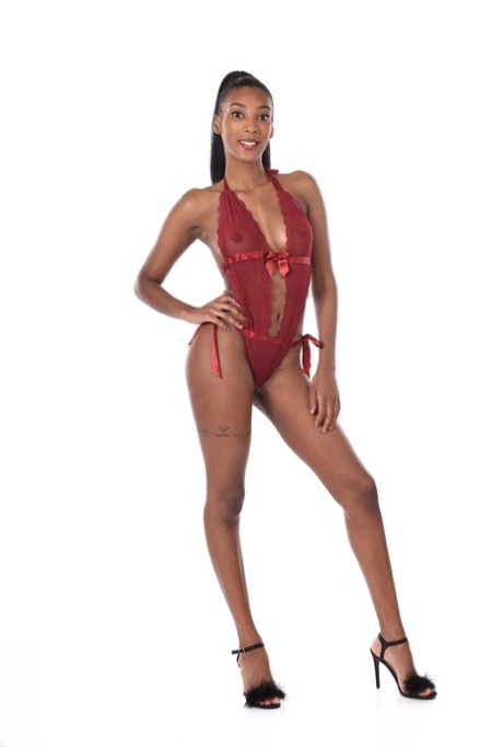 Leggy ebony model Asia Rae doffs lingerie prior to fingering her pussy