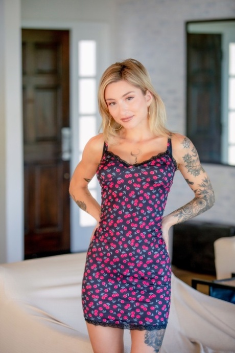 Tattooed blonde Kathryn Mae gets jizz on her big tits during a fuck