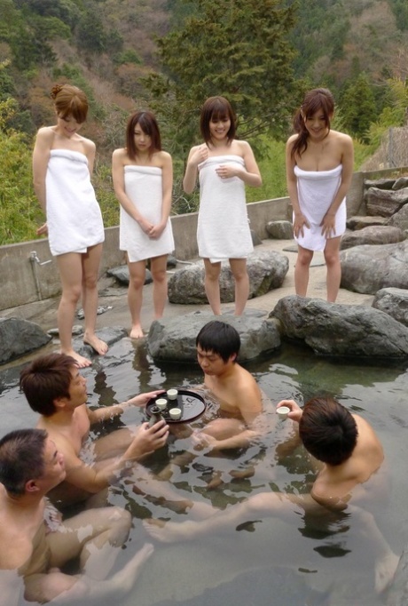 Japanese girls masturbate prior to group sex in an outdoor hot tub