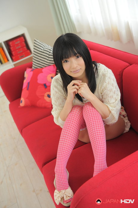 Adorable Japanese girl Hina Maeda shows her bare bottom in over the knee socks