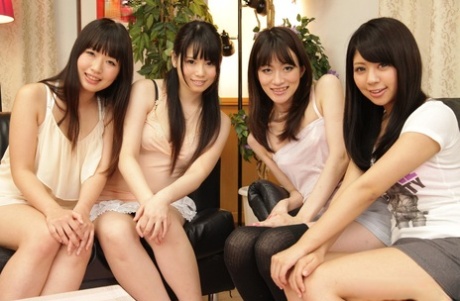 A group of pretty Japanese girls get naked while boys look on