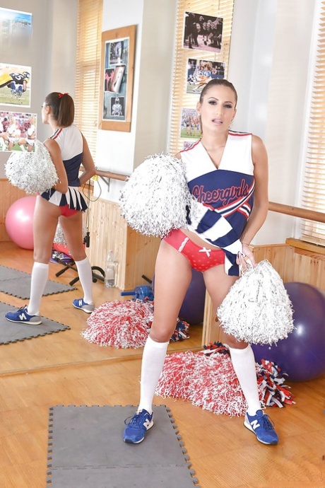 Cute cheerleader Sensual Jane fondling her huge natural juggs