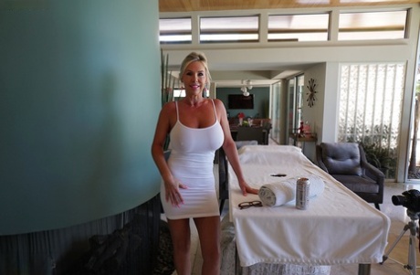 Hot housewife Sandra Otterson lets her knockers loose from short white dress
