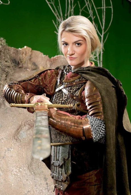 Blonde female Amanda Tate strips off her medieval cosplay outfit