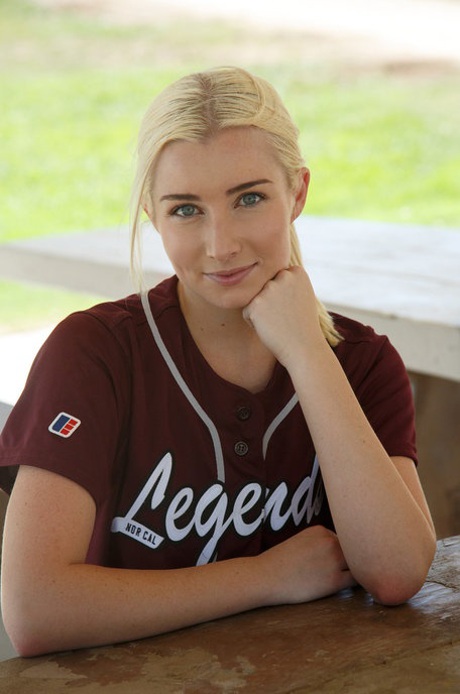 Sporty blonde Morgan Attwood flashing tiny tits & hot ass in a softball field