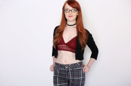 Nerdy redheaded teen Krystal Orchid gets penetrated by a large cock after