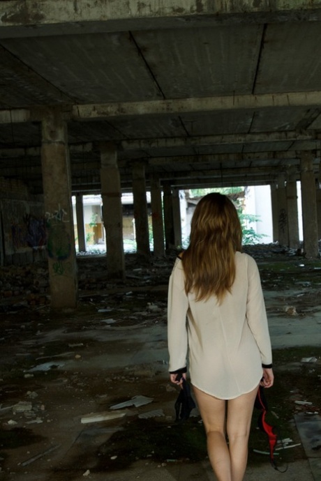 Latvian teen Alice Smith goes to an abandoned place to play with her pussy