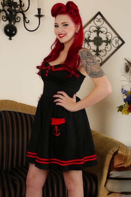 Sexy pinup Amber Ivy sheds her sailor dress to show pussy lips in red heels