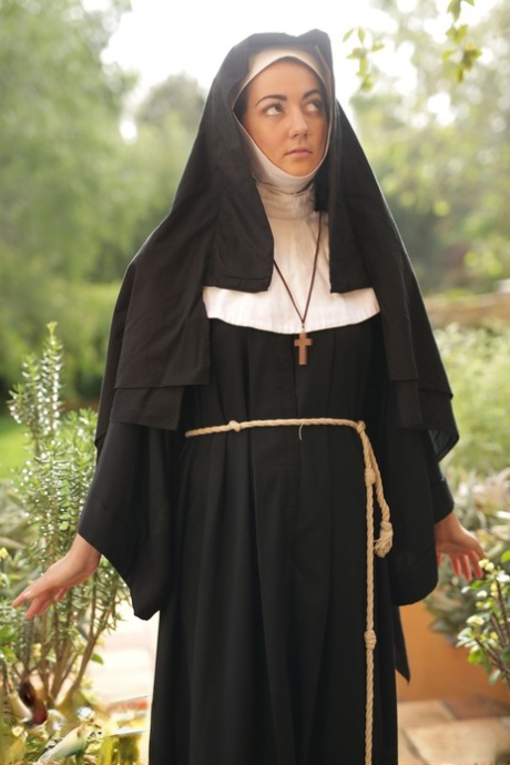 Sister Lily Adams doffs habit to air perfect natural tits & nun cunt outdoors