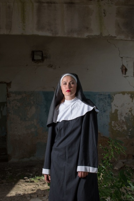 Ukrainian nun Judith Able undresses and touches her juicy tits & pussy