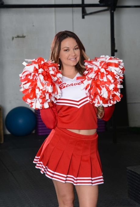 White college girl Brooke Beretta strips off her cheerleader uniform