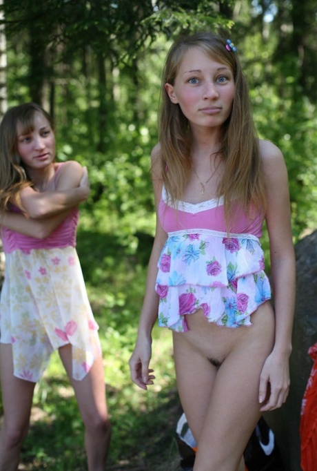Blonde twins Sascha M & Mascha show their sweet teen tits outdoors