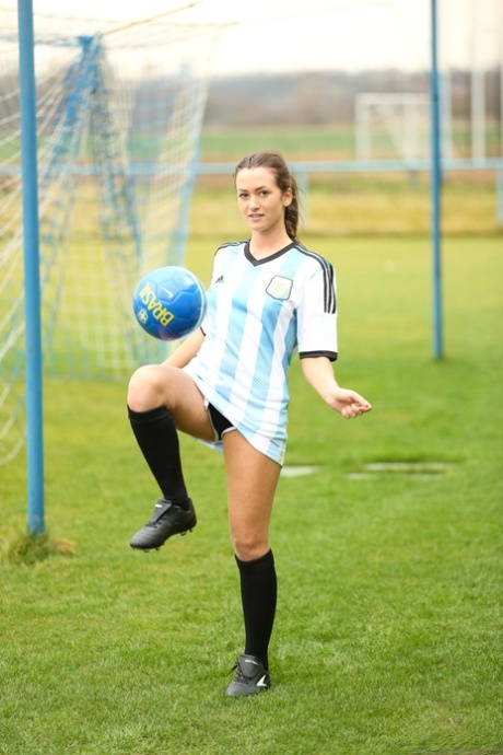 Argentinian soccer player Tess strips off her uniform and masturbates