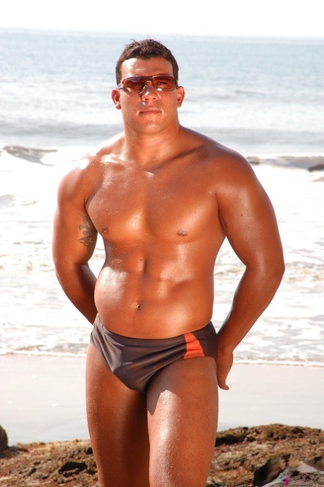 Gay Latino Alexandre Senna shows his sexy tanned body & dick on the beach