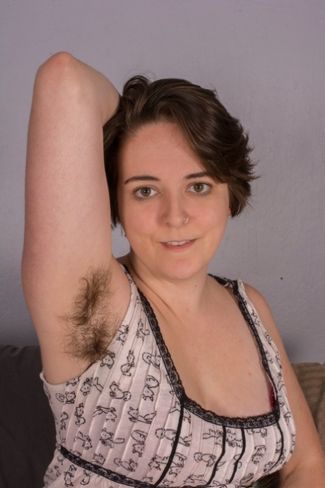 Brunette amateur with hairy armpits Harley Hex flaunts her bushy body