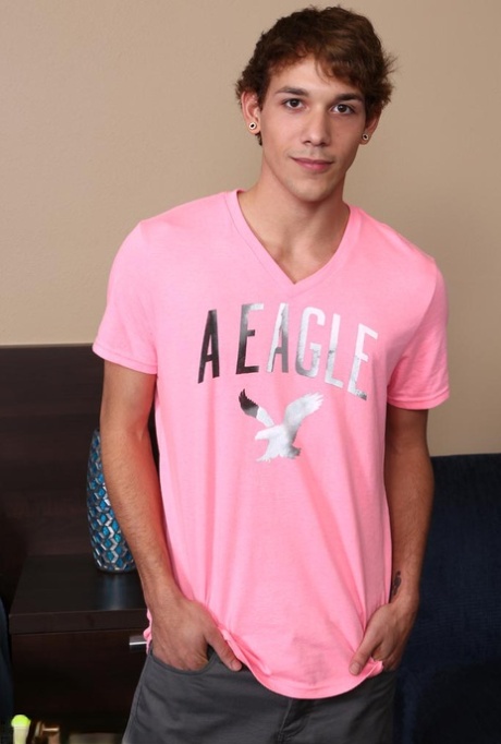 Cute teen gay Malik doffs his pink shirt and pulls out his massive dick