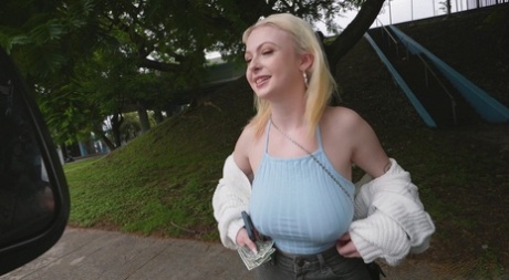 Curvy blonde teen Carrie Sage unveils her big tits and rides a dick in a van