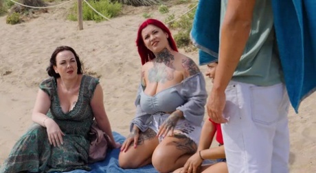 Busty redhead Sabien DeMonia gets a DP in a wild outdoor foursome