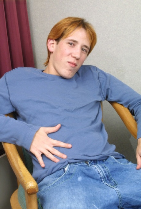 Kinky gay redhead Kasper doffs his jeans and jerks off his boner