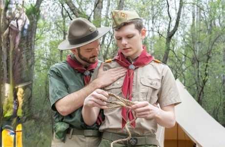 Horny twink Scout Ethan takes a stiff boner from behind by Scoutmaster Barrett