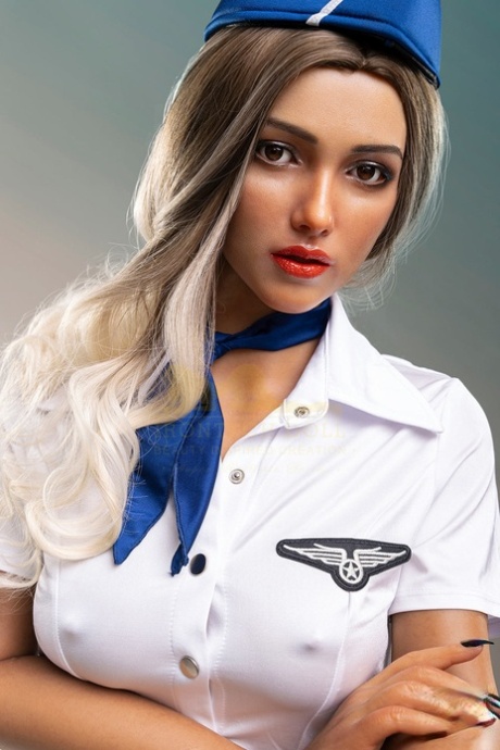 Stewardess sex doll Salome strips her sexy uniform and shows her boobs