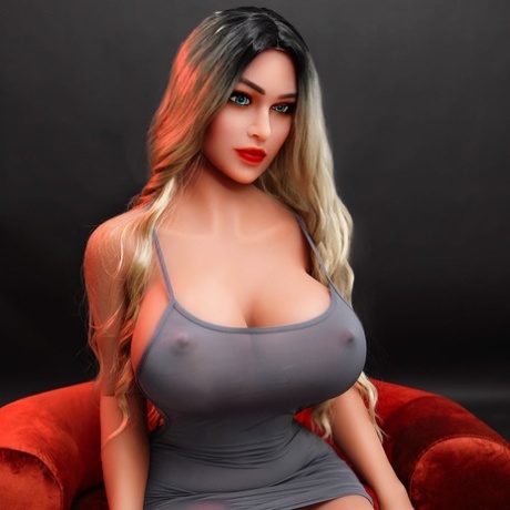 Sensational sex doll Aubree undresses & shows her huge boobs with hot nipples