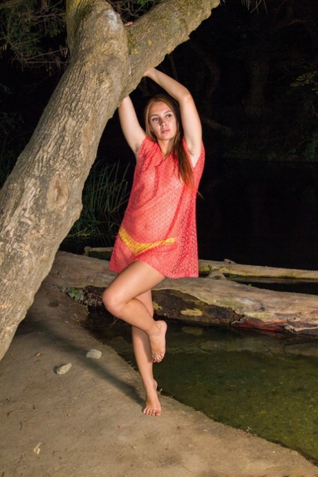 Beautiful Ukrainian model Alya Shon spreading her hairy wet pussy in the water